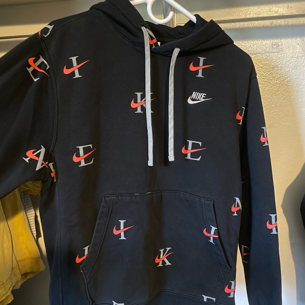 Nike Men's Black Hoodie with Red and White Logo Pattern